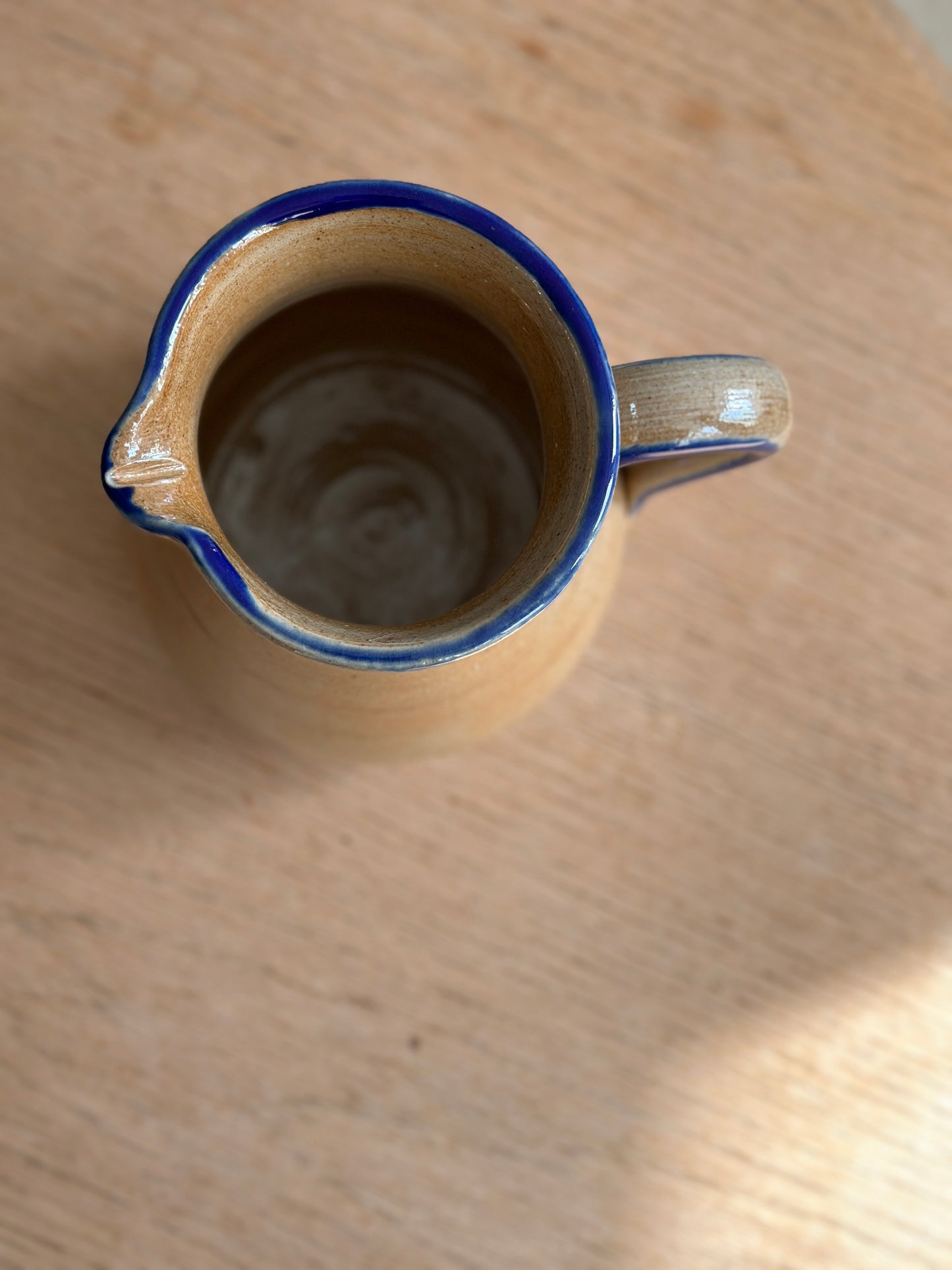 Lertøjskande med blå kant