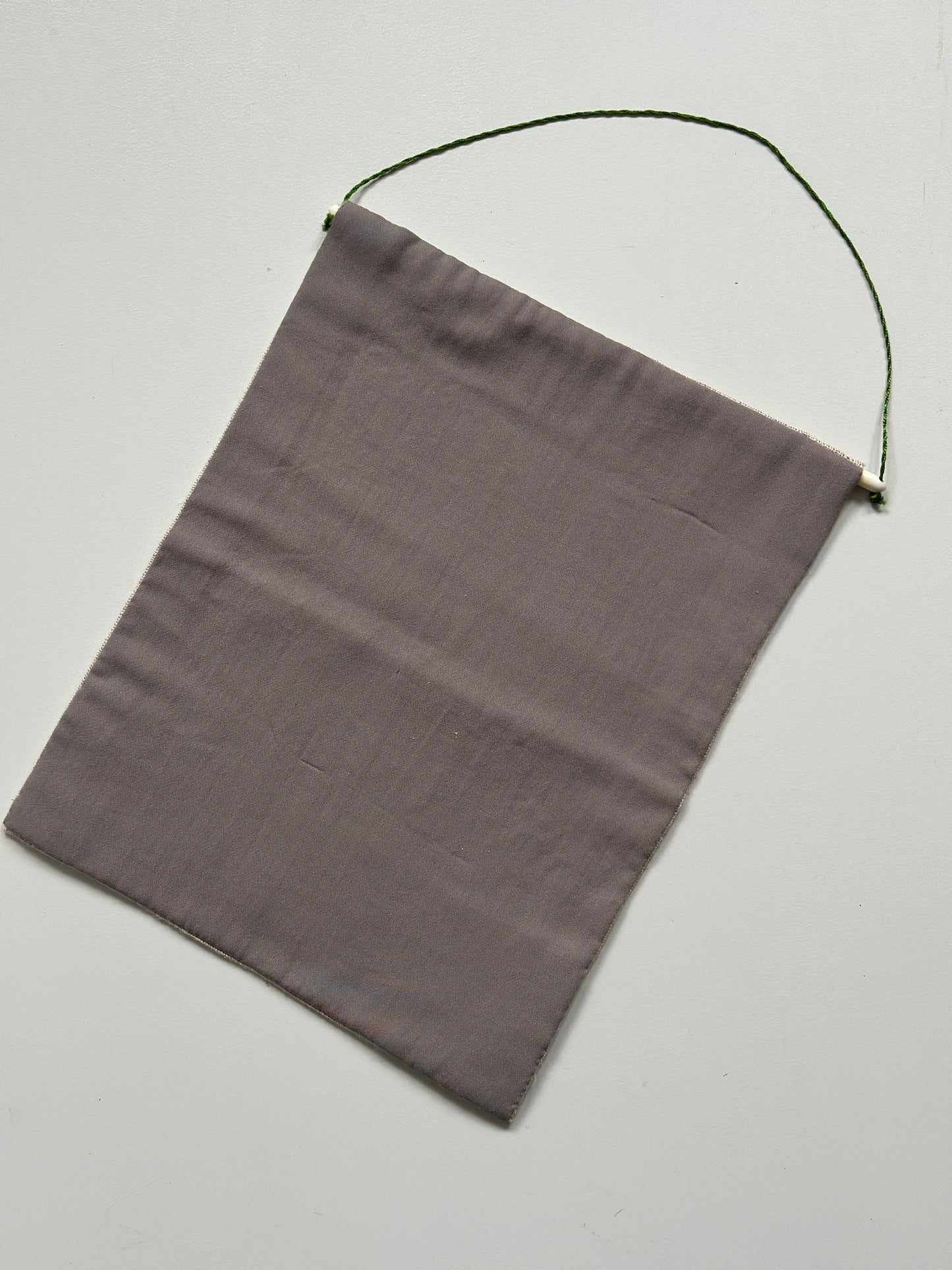 Vægophæng i tekstil